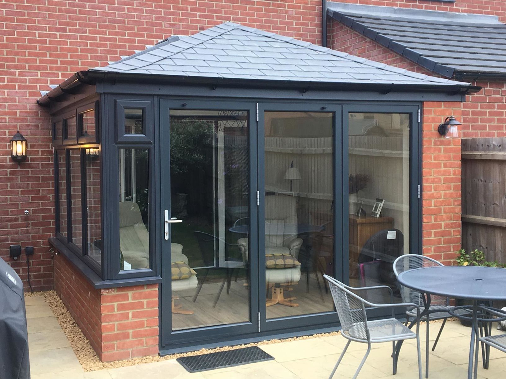 Solid roof conservatory with anthracite grey windows and doors, Northampton